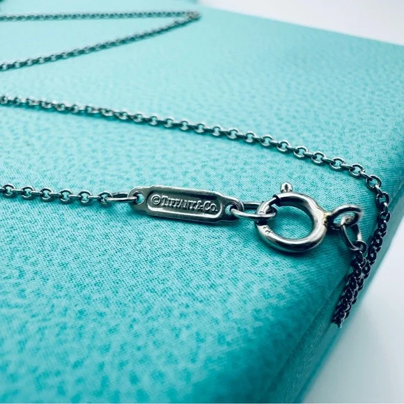 Tiffany & Co. .21 TCW Diamond Cross Necklace in Platinum with Packaging - Picture 8 of 13